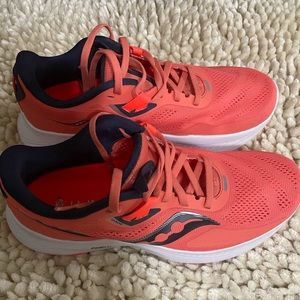 Almost new!  The color is closer to coral than orange